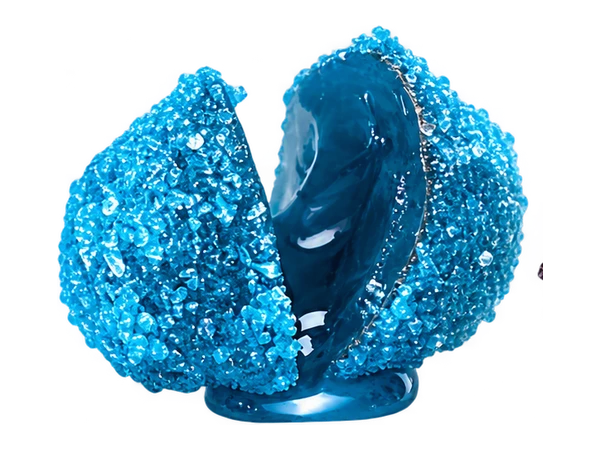 Blue Razz candy split open to reveal its juicy center