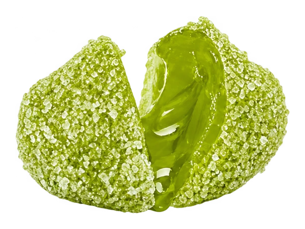 Green Apple candy split open to reveal its juicy center