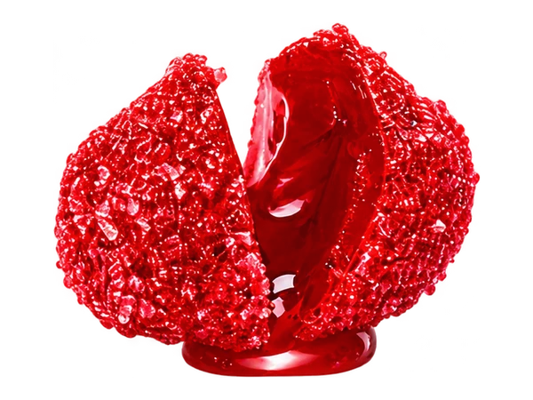 Raspberry candy split open to reveal its juicy center