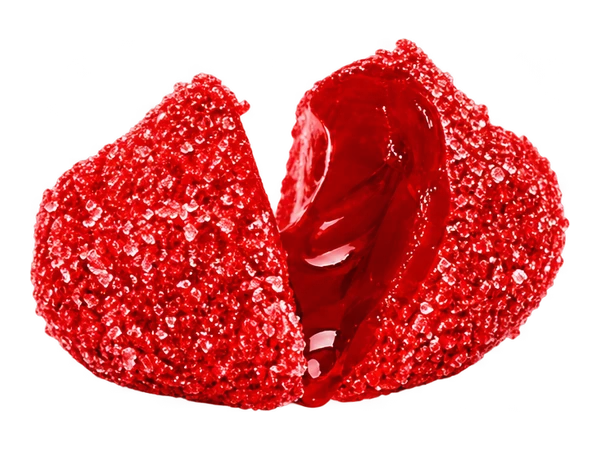 Wild Cherry candy split open to reveal its juicy center
